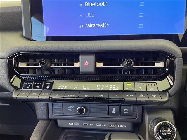 ランドクルーザー250 ZX 禁煙車 純正ナビ フルセグTV Bluetooth USB HDMI JBLプレミアムサウンド ムーンルーフ AC100V充電 電動格納サードシート パワーバックドア パワーシート 置くだけ充電(18枚目)