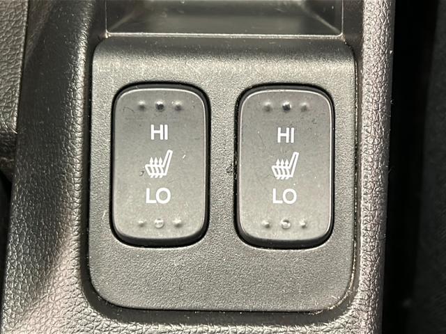 フィット 13G・Fパッケージ コンフォートエディション 4WD シートヒーター 横滑り防止装置 アイドリングストップ ヘッドライトレベライザー 熱線入りフロントウインドウ ヒーテッドドアミラー チップアップリヤシート 純正ナビ バックカメラ ETC(37枚目)