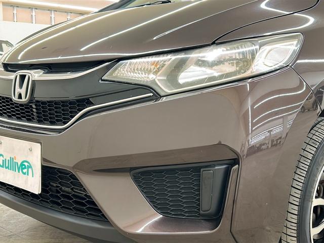 フィット 13G・Fパッケージ コンフォートエディション 4WD シートヒーター 横滑り防止装置 アイドリングストップ ヘッドライトレベライザー 熱線入りフロントウインドウ ヒーテッドドアミラー チップアップリヤシート 純正ナビ バックカメラ ETC(41枚目)