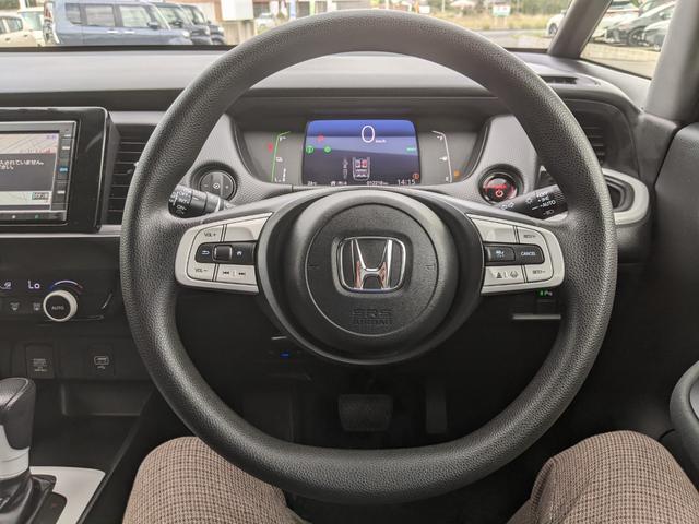 フィット ｅ：ＨＥＶベーシック　モデュロエアロ　純正ナビ　バックカメラ　ｂｌｕｅｔｏｏｔｈ　ＣＤ　ＤＶＤ　衝突被害軽減ブレーキ　ＥＴＣ　ホンダセンシングＬＥＤヘッドライト　コーナーセンサー（12枚目）
