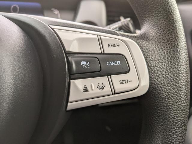 フィット ｅ：ＨＥＶベーシック　モデュロエアロ　純正ナビ　バックカメラ　ｂｌｕｅｔｏｏｔｈ　ＣＤ　ＤＶＤ　衝突被害軽減ブレーキ　ＥＴＣ　ホンダセンシングＬＥＤヘッドライト　コーナーセンサー（14枚目）