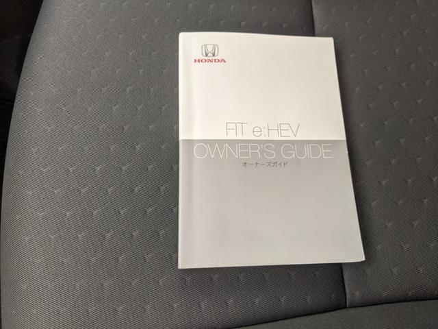 フィット ｅ：ＨＥＶベーシック　モデュロエアロ　純正ナビ　バックカメラ　ｂｌｕｅｔｏｏｔｈ　ＣＤ　ＤＶＤ　衝突被害軽減ブレーキ　ＥＴＣ　ホンダセンシングＬＥＤヘッドライト　コーナーセンサー（49枚目）