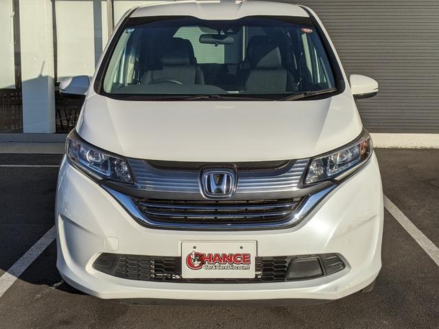 フリードハイブリッド ハイブリッド・EX Bluetooth CD DVD 前席シートヒーター レーダークルコン レーンアシスト ETC 衝突軽減ブレーキ 電動格納ミラー LEDヘッドライト オートライト 純正ナビ 両側パワースライドドア(3枚目)