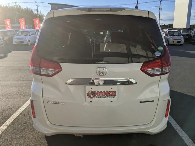 フリードハイブリッド ハイブリッド・EX Bluetooth CD DVD 前席シートヒーター レーダークルコン レーンアシスト ETC 衝突軽減ブレーキ 電動格納ミラー LEDヘッドライト オートライト 純正ナビ 両側パワースライドドア(7枚目)