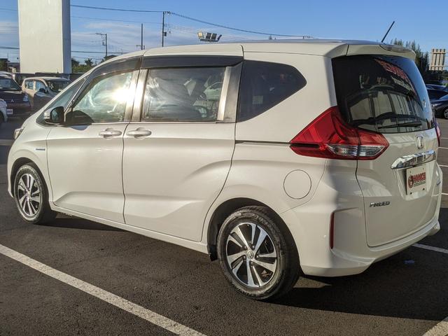 フリードハイブリッド ハイブリッド・EX Bluetooth CD DVD 前席シートヒーター レーダークルコン レーンアシスト ETC 衝突軽減ブレーキ 電動格納ミラー LEDヘッドライト オートライト 純正ナビ 両側パワースライドドア(8枚目)