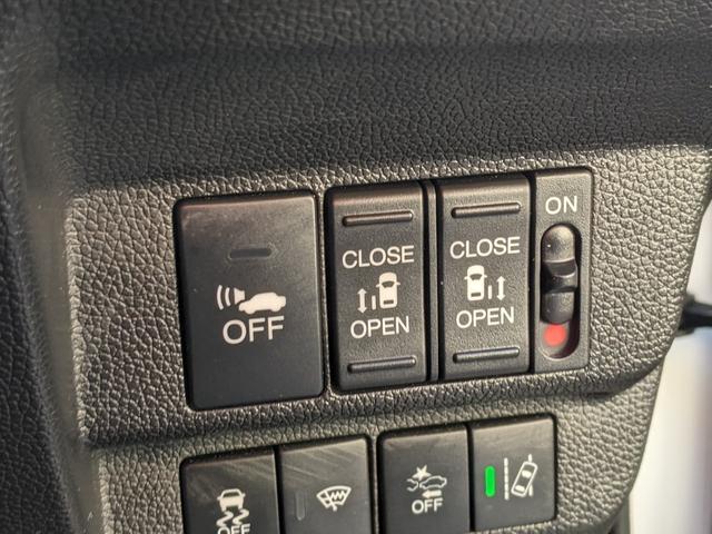 フリードハイブリッド ハイブリッド・EX Bluetooth CD DVD 前席シートヒーター レーダークルコン レーンアシスト ETC 衝突軽減ブレーキ 電動格納ミラー LEDヘッドライト オートライト 純正ナビ 両側パワースライドドア(26枚目)