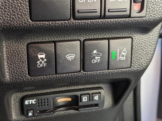 フリードハイブリッド ハイブリッド・EX Bluetooth CD DVD 前席シートヒーター レーダークルコン レーンアシスト ETC 衝突軽減ブレーキ 電動格納ミラー LEDヘッドライト オートライト 純正ナビ 両側パワースライドドア(27枚目)