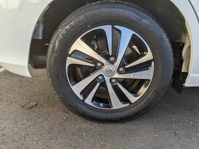 フリードハイブリッド ハイブリッド・EX Bluetooth CD DVD 前席シートヒーター レーダークルコン レーンアシスト ETC 衝突軽減ブレーキ 電動格納ミラー LEDヘッドライト オートライト 純正ナビ 両側パワースライドドア(49枚目)