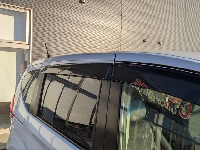 フリードハイブリッド ハイブリッド・EX Bluetooth CD DVD 前席シートヒーター レーダークルコン レーンアシスト ETC 衝突軽減ブレーキ 電動格納ミラー LEDヘッドライト オートライト 純正ナビ 両側パワースライドドア(56枚目)