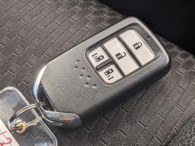 ステップワゴンスパーダ スパーダハイブリッド　Ｇ　ホンダセンシング　両側パワースライドドア　純正９インチインターナビ　フルセグＴＶｂｌｕｅｔｏｏｔｈ　ＣＤ　ＤＶＤ　バックカメラ　フリップダウンモニター　ＬＥＤヘッドライト　レーダークルーズコントロール（32枚目）