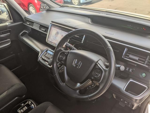 ステップワゴンスパーダ スパーダハイブリッド　Ｇ　ホンダセンシング　両側パワースライドドア　純正９インチインターナビ　フルセグＴＶｂｌｕｅｔｏｏｔｈ　ＣＤ　ＤＶＤ　バックカメラ　フリップダウンモニター　ＬＥＤヘッドライト　レーダークルーズコントロール（35枚目）