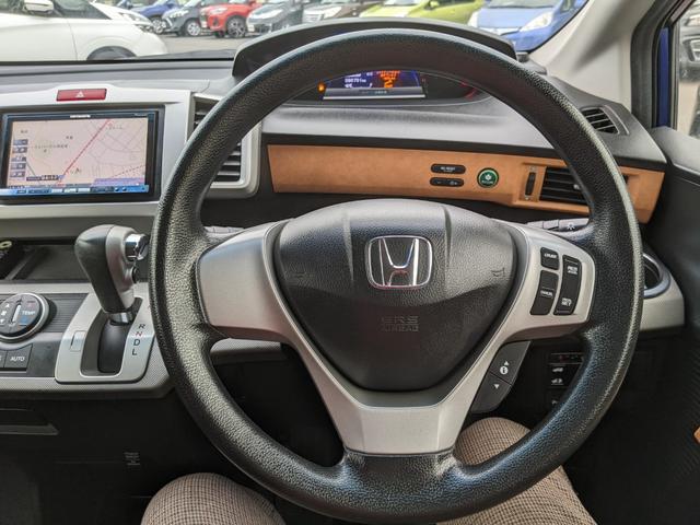 フリードハイブリッド ハイブリッド 社外ナビ フルセグ CD DVD 横滑り防止 コーナーセンサー 片側パワースライドドア クルーズコントロール オートライト ETC キーレス HIDヘッドライト 電動格納ミラー(11枚目)