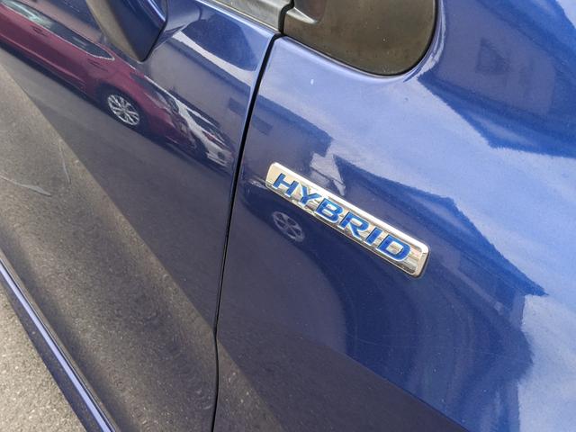 フリードハイブリッド ハイブリッド 社外ナビ フルセグ CD DVD 横滑り防止 コーナーセンサー 片側パワースライドドア クルーズコントロール オートライト ETC キーレス HIDヘッドライト 電動格納ミラー(56枚目)