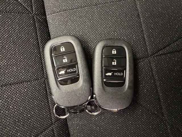 ヴェゼル e:HEV Z 登録済未使用車 純正ディスプレイオーディオ 純正メモリナビ ワイヤレス充電 コーナーセンサー ACC LKA PCS BSM バックカメラ パドルシフト ビルトインETC2.0 シートヒーター(19枚目)