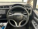 ハイブリッド ホンダセンシング 社外メモリナビ(Bluetooth/SD/USB) バックカメラ 追従型クルーズコントロール スタッドレスタイヤ積込 レーンキープアシスト 衝突被害軽減ブレーキ 社外フロアマット ビルトインETC(34枚目)