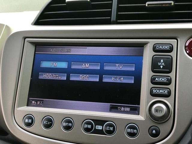 フィットハイブリッド ハイブリッド・ナビプレミアムセレクション　保証書／純正　ＨＤＤナビ／シートヒーター／ヘッドランプ　ＨＩＤ／ＥＴＣ／ＥＢＤ付ＡＢＳ／横滑り防止装置／アイドリングストップ／バックモニター／ＤＶＤ／エアバッグ　運転席／エアバッグ　助手席　ＤＶＤ再生（10枚目）