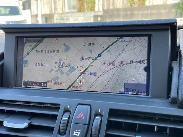 Ｚ４ ｓＤｒｉｖｅ２３ｉ　ハイラインパッケージ　電動開閉式ハードトップ　茶革シート　純正ＨＤＤナビ（ＡＵＸ／ＵＳＢ／ＣＤ／ＤＶＤ／フルセグ）　ＨＩＤライト　左右独立式オートエアコン　純正１７インチアルミホイール　純正フロアマット（5枚目）