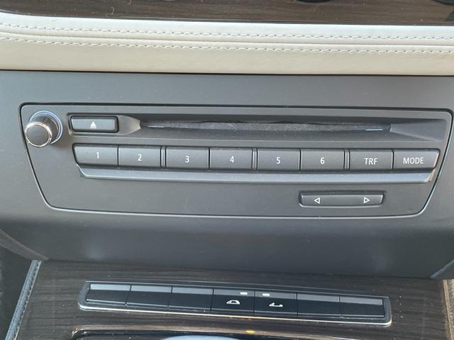 Ｚ４ ｓＤｒｉｖｅ２３ｉ　ハイラインパッケージ　電動開閉式ハードトップ　茶革シート　純正ＨＤＤナビ（ＡＵＸ／ＵＳＢ／ＣＤ／ＤＶＤ／フルセグ）　ＨＩＤライト　左右独立式オートエアコン　純正１７インチアルミホイール　純正フロアマット（26枚目）