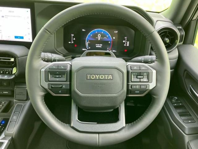 ランドクルーザー２５０ ４ＷＤ　ＶＸ　サンルーフ／保証書／純正　ＳＤナビ／デジタルインナーミラー／シートヒーター／全方位モニター／車線逸脱防止支援システム／シート　フルレザー／電動バックドア／ヘッドランプ　ＬＥＤ／ＥＴＣ　革シート　４ＷＤ（15枚目）