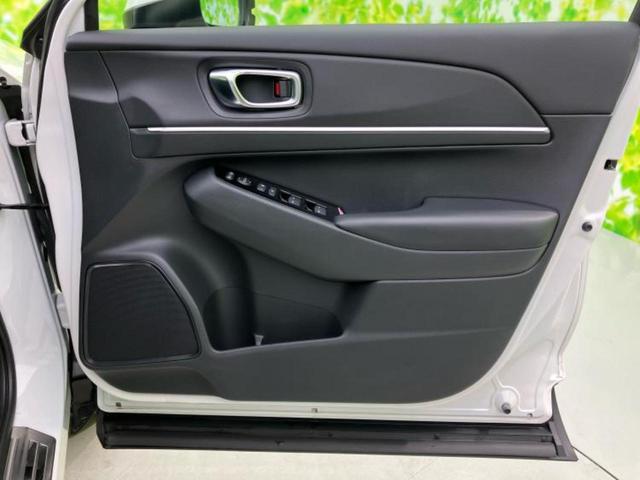 ヴェゼル ｅＨＥＶ　Ｚ　保証書／純正　９インチ　ＳＤナビ／衝突安全装置／シートヒーター／車線逸脱防止支援システム／シート　ハーフレザー／電動バックドア／ヘッドランプ　ＬＥＤ／ＥＴＣ／ＥＢＤ付ＡＢＳ／横滑り防止装置（20枚目）