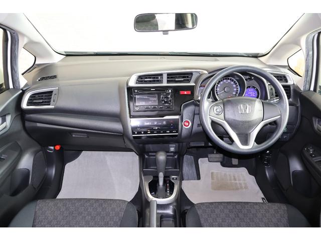 フィット １３Ｇ・Ｆパッケージ　オートリトラミラー　スマキー　ＶＳＡ　スマ－トキ－　助手席エアバッグ　オートエアコン　エアバック　ＰＳ　キ－フリ－　ＰＷ　ＡＢＳ　アイドリングＳＴＯＰ（7枚目）