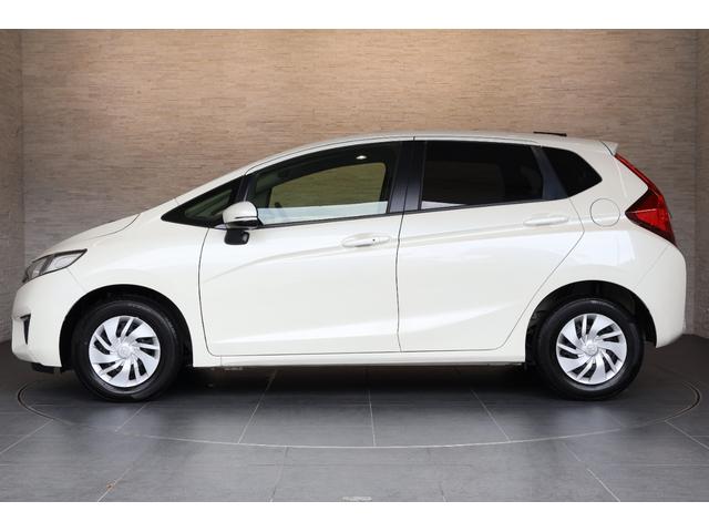 フィット １３Ｇ・Ｆパッケージ　オートリトラミラー　スマキー　ＶＳＡ　スマ－トキ－　助手席エアバッグ　オートエアコン　エアバック　ＰＳ　キ－フリ－　ＰＷ　ＡＢＳ　アイドリングＳＴＯＰ（11枚目）