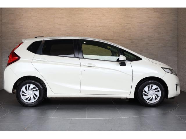 フィット １３Ｇ・Ｆパッケージ　オートリトラミラー　スマキー　ＶＳＡ　スマ－トキ－　助手席エアバッグ　オートエアコン　エアバック　ＰＳ　キ－フリ－　ＰＷ　ＡＢＳ　アイドリングＳＴＯＰ（15枚目）