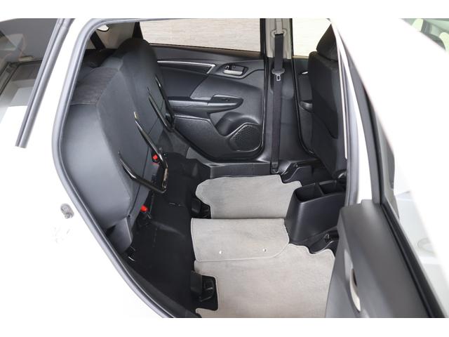 フィット １３Ｇ・Ｆパッケージ　オートリトラミラー　スマキー　ＶＳＡ　スマ－トキ－　助手席エアバッグ　オートエアコン　エアバック　ＰＳ　キ－フリ－　ＰＷ　ＡＢＳ　アイドリングＳＴＯＰ（22枚目）