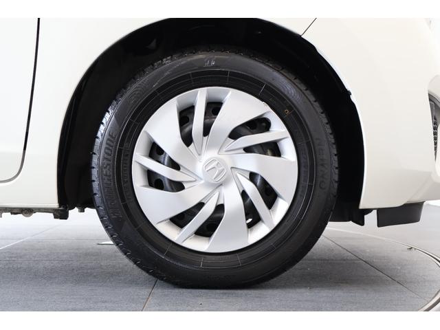 フィット １３Ｇ・Ｆパッケージ　オートリトラミラー　スマキー　ＶＳＡ　スマ－トキ－　助手席エアバッグ　オートエアコン　エアバック　ＰＳ　キ－フリ－　ＰＷ　ＡＢＳ　アイドリングＳＴＯＰ（23枚目）