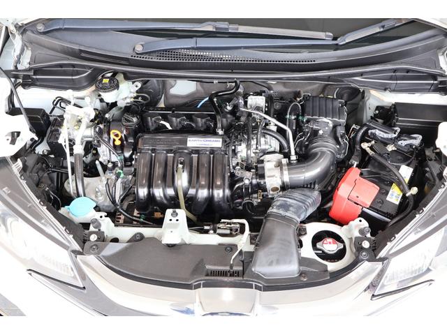 フィット １３Ｇ・Ｆパッケージ　オートリトラミラー　スマキー　ＶＳＡ　スマ－トキ－　助手席エアバッグ　オートエアコン　エアバック　ＰＳ　キ－フリ－　ＰＷ　ＡＢＳ　アイドリングＳＴＯＰ（26枚目）