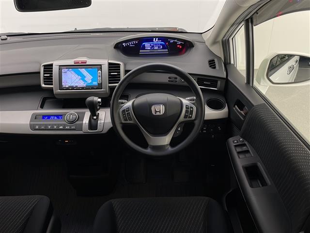 フリードハイブリッド ジャストセレクション ワンオーナー 禁煙 純正7インチナビ ワンセグTV CD DVD バックカメラ 両側パワースライドドア クルーズコントロール ビルトインETC 社外16インチAW スマートキー 保証書 取扱説明書(11枚目)