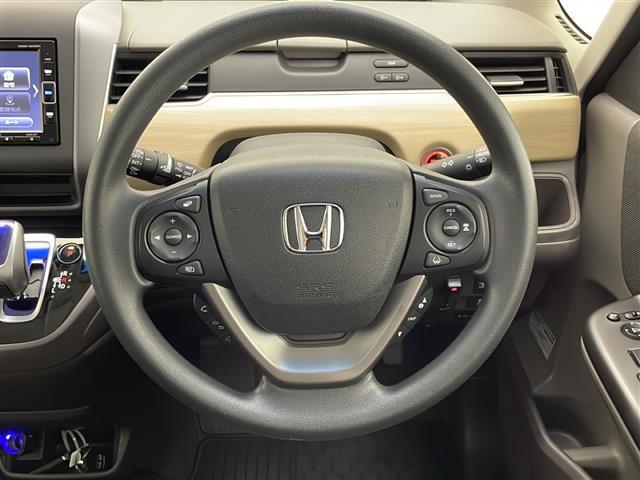 フリードハイブリッド ハイブリッド・Gホンダセンシング ワンオーナー 禁煙 ホンダセンシング 純正7インチSDナビ フルセグTV CD DVD バックカメラ 両側パワースライドドア LEDヘッドライト ビルトインETC スマートキー2個 保証書 取扱説明書(14枚目)