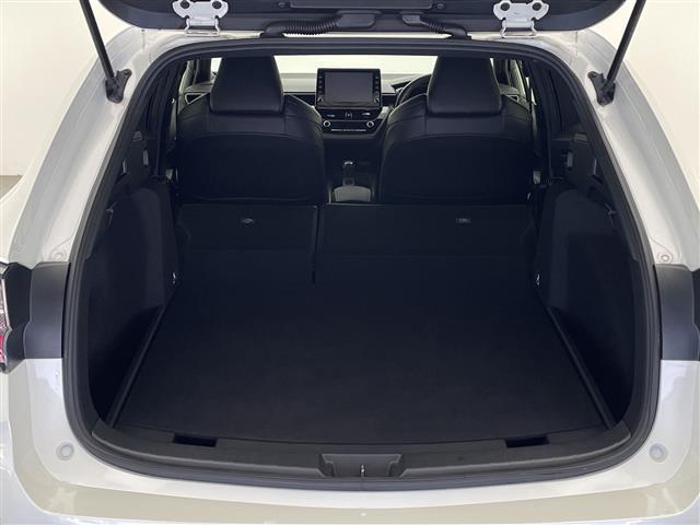 カローラツーリング ハイブリッド ダブルバイビー 禁煙 モデリスタフルエアロ トヨタセーフティーセンス ブラインドスポットモニター 純正9インチナビ フルセグTV バックカメラ ハーフレザーシート シートヒーター ハンドルヒーター ビルトインETC(24枚目)