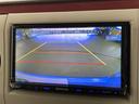 アルトラパンショコラ Ｘ　禁煙車　社外ナビＴＶ　バックカメラ　ウインカードアミラー　オートエアコン　スマートキー　プッシュエンジンスタート　ドアバイザー　純正キセノンオートライト　本革巻ハンドル　リアプライバシーガラス（3枚目）