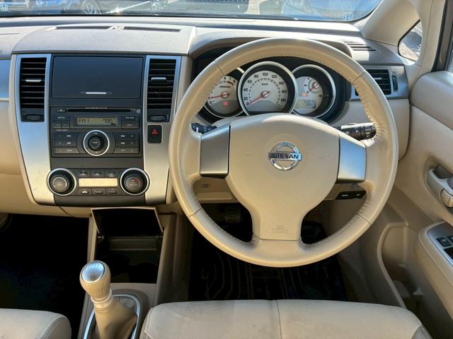 ティーダ １８Ｇ　フォグライト　電動格納ミラー　オートエアコン　半革シート　社外アルミホイール　ＥＴＣ　パワーステアリング　パワーウインドウ（21枚目）