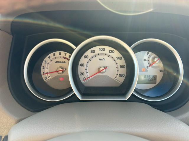 ティーダ １８Ｇ　フォグライト　電動格納ミラー　オートエアコン　半革シート　社外アルミホイール　ＥＴＣ　パワーステアリング　パワーウインドウ（23枚目）