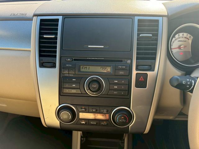 ティーダ １８Ｇ　フォグライト　電動格納ミラー　オートエアコン　半革シート　社外アルミホイール　ＥＴＣ　パワーステアリング　パワーウインドウ（24枚目）