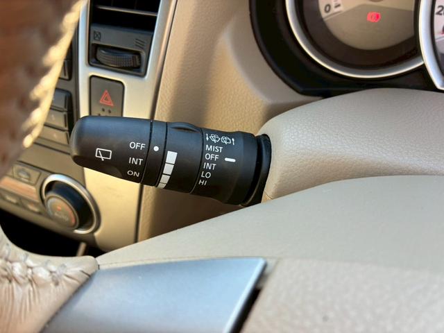 ティーダ １８Ｇ　フォグライト　電動格納ミラー　オートエアコン　半革シート　社外アルミホイール　ＥＴＣ　パワーステアリング　パワーウインドウ（29枚目）