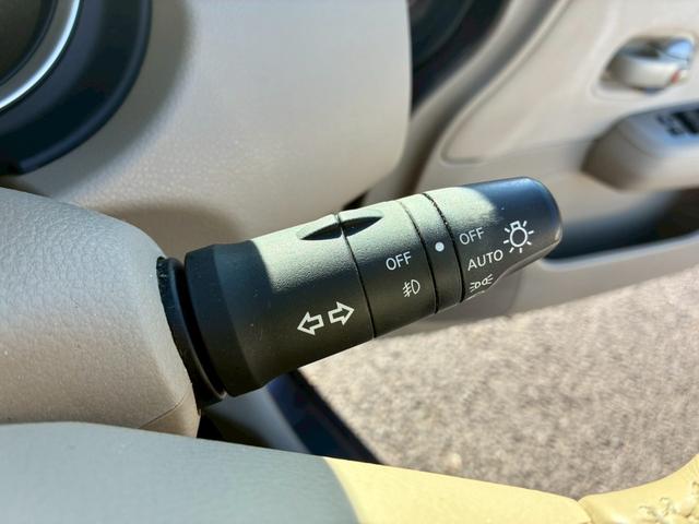 ティーダ １８Ｇ　フォグライト　電動格納ミラー　オートエアコン　半革シート　社外アルミホイール　ＥＴＣ　パワーステアリング　パワーウインドウ（30枚目）