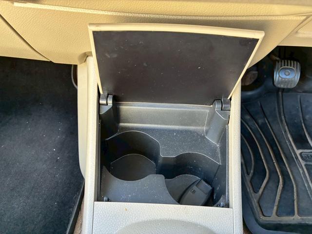 ティーダ １８Ｇ　フォグライト　電動格納ミラー　オートエアコン　半革シート　社外アルミホイール　ＥＴＣ　パワーステアリング　パワーウインドウ（32枚目）