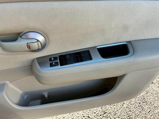 ティーダ １８Ｇ　フォグライト　電動格納ミラー　オートエアコン　半革シート　社外アルミホイール　ＥＴＣ　パワーステアリング　パワーウインドウ（33枚目）