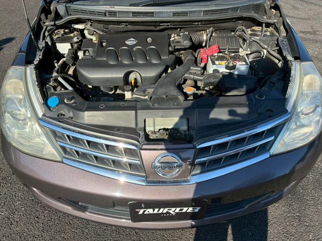 ティーダ １８Ｇ　フォグライト　電動格納ミラー　オートエアコン　半革シート　社外アルミホイール　ＥＴＣ　パワーステアリング　パワーウインドウ（34枚目）