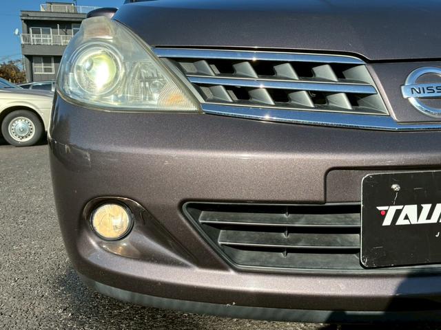 ティーダ １８Ｇ　フォグライト　電動格納ミラー　オートエアコン　半革シート　社外アルミホイール　ＥＴＣ　パワーステアリング　パワーウインドウ（35枚目）