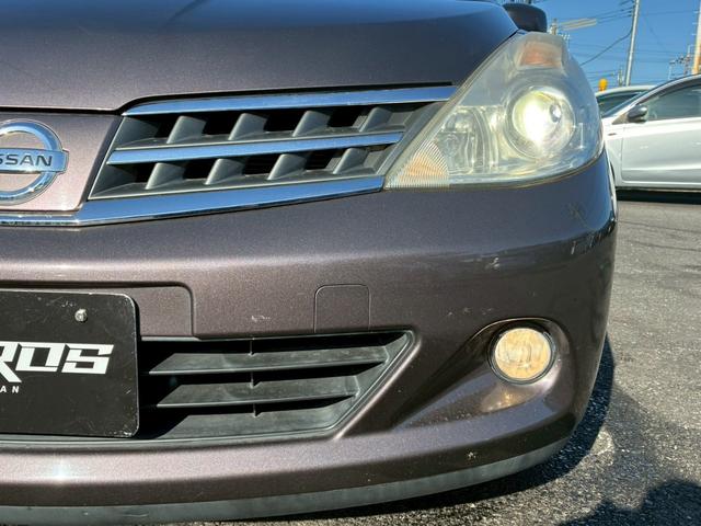 ティーダ １８Ｇ　フォグライト　電動格納ミラー　オートエアコン　半革シート　社外アルミホイール　ＥＴＣ　パワーステアリング　パワーウインドウ（36枚目）