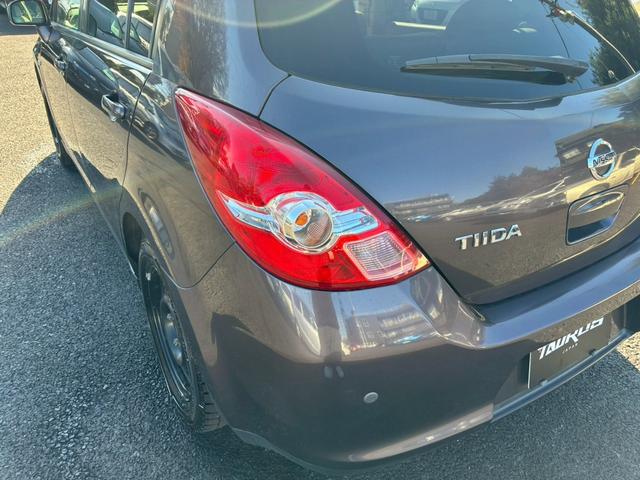 ティーダ １８Ｇ　フォグライト　電動格納ミラー　オートエアコン　半革シート　社外アルミホイール　ＥＴＣ　パワーステアリング　パワーウインドウ（37枚目）