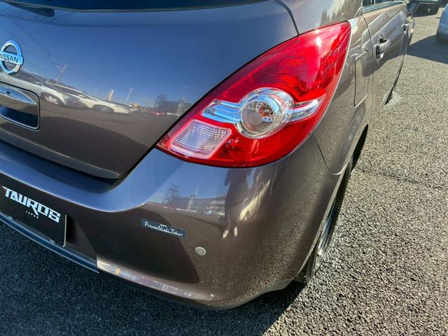 ティーダ １８Ｇ　フォグライト　電動格納ミラー　オートエアコン　半革シート　社外アルミホイール　ＥＴＣ　パワーステアリング　パワーウインドウ（38枚目）