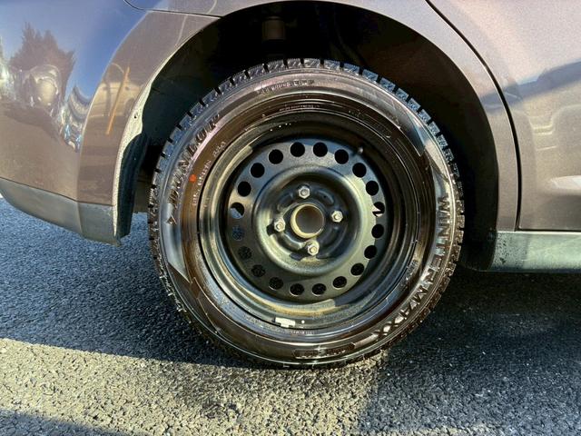 ティーダ １８Ｇ　フォグライト　電動格納ミラー　オートエアコン　半革シート　社外アルミホイール　ＥＴＣ　パワーステアリング　パワーウインドウ（42枚目）