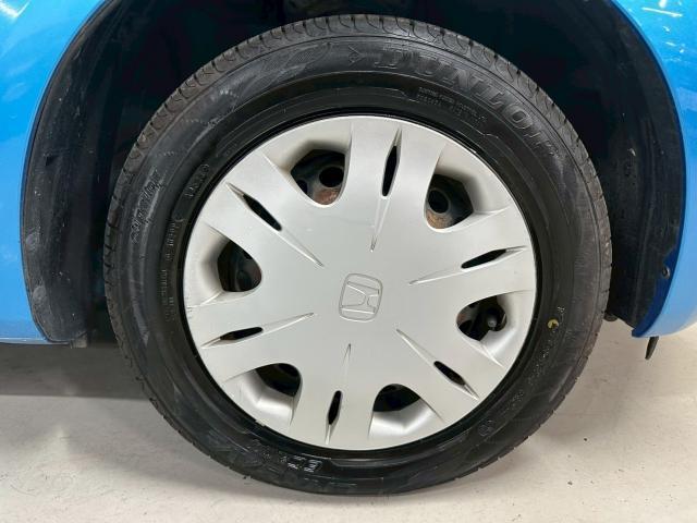 フィット G ユーザー買取車 ワンオーナー ETC キーレスキー マニュアルエアコン 電動ドアミラー バイザー リアワイパー パワーステアリング パワーウィンドウ アクセサリーソケット(21枚目)