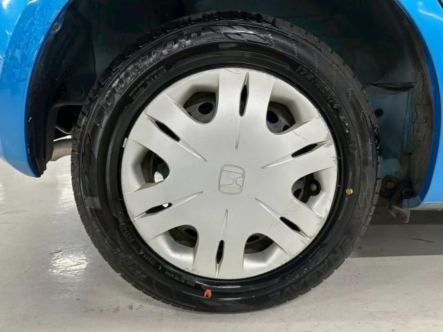 フィット G ユーザー買取車 ワンオーナー ETC キーレスキー マニュアルエアコン 電動ドアミラー バイザー リアワイパー パワーステアリング パワーウィンドウ アクセサリーソケット(22枚目)