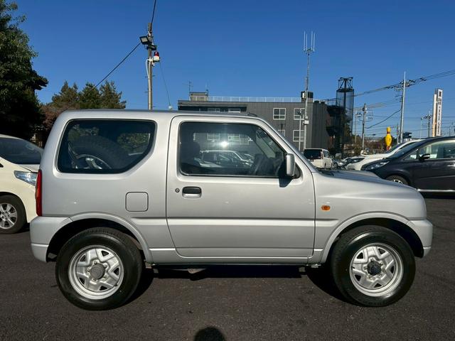 ジムニー ＸＧ　エアコン　４ＷＤ　パワーステアリング　パワーウインドウ　ライトレベライザー　補助ミラー　１６インチタイヤ　スペアタイヤ　リアワイパー（10枚目）